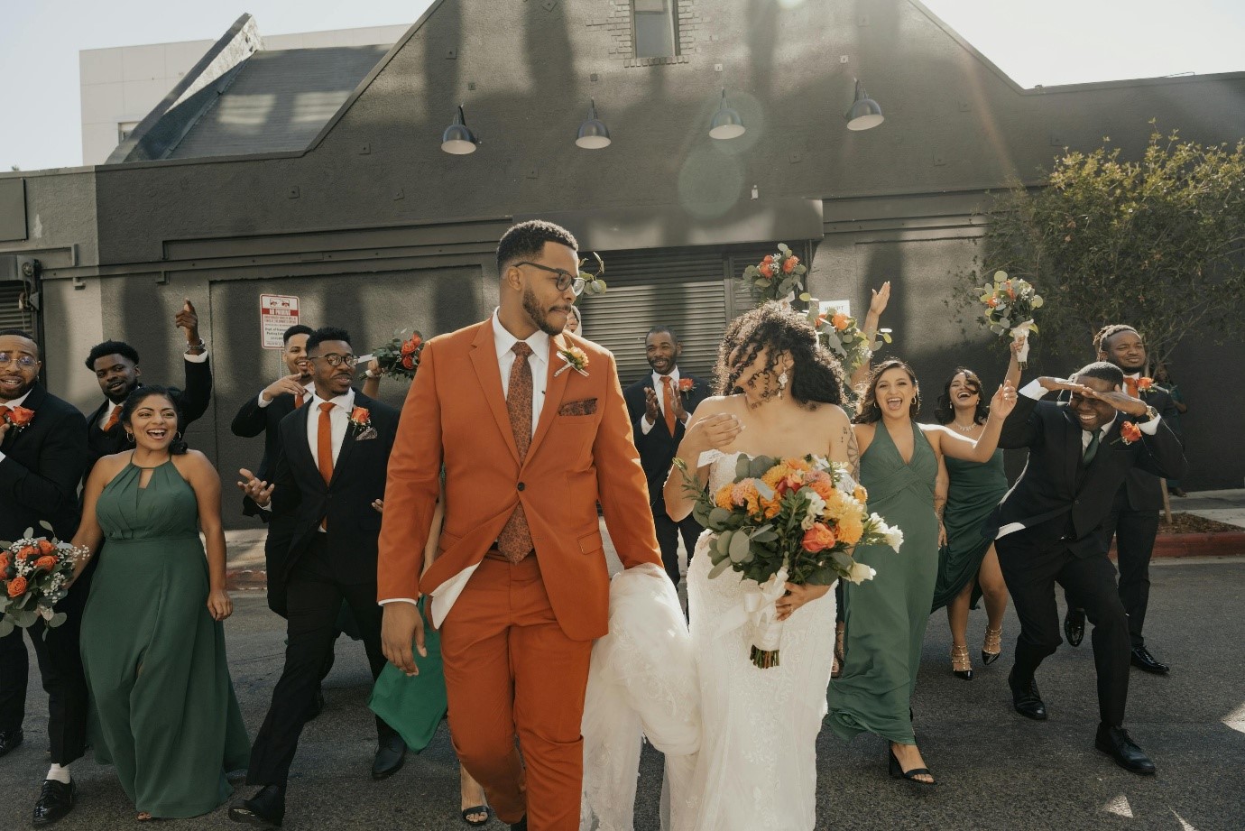 Wedding Season Ready: Wedding Suits for Groom and Groomsmen That Make Men Look Sharp in 2026 Wedding season in 2026 is not just about attending ceremonies — it’s about showing up with style, confidence, and presence. Modern men's fashion has evolved far beyond the traditional black tuxedo. Today, weddings are full of personality, creative venues, and stylish dress codes. Whether you are the groom, a groomsman, or a guest, choosing the right outfit makes a powerful impression. The right wedding suits for groom and groomsmen combine modern tailoring, breathable fabrics, and thoughtful accessories that look incredible both in person and in photos. If you want to step into wedding season looking confident and refined, here are the top outfit trends every man should know in 2026. ________________________________________ Modern Tailored Wedding Suits for Groom and Groomsmen The biggest rule in men’s wedding fashion in 2026 is simple: Fit is everything. The days of oversized, boxy suits are fading. Today’s wedding suits for groom and groomsmen focus on clean tailoring that enhances the natural shape of the body without feeling tight or uncomfortable. A well-tailored suit instantly makes a man look: • More confident • More polished • More stylish Popular colors for groom and groomsmen suits include: • Deep navy • Charcoal grey • Sage green • Beige and sand tones • Classic black for formal weddings Coordinated suits for the groom and groomsmen create a sharp, unified wedding party look that photographs beautifully. ________________________________________ Linen Wedding Suits for Groom and Groomsmen (Perfect for Summer Weddings) Comfort is one of the biggest priorities in 2026 wedding fashion. Many weddings take place outdoors, at beaches, gardens, vineyards, or destination venues. Because of this, lightweight fabrics are becoming essential for wedding suits for groom and groomsmen. Top breathable fabrics include: • Linen • Cotton blends • Lightweight wool • Seersucker Linen suits are especially popular for summer weddings because they provide a relaxed yet elegant look. For example: • Groom in cream or beige linen suit • Groomsmen in light tan or soft blue linen suits This creates a stylish but natural wedding aesthetic. ________________________________________ Statement Blazers for Stylish Grooms 4 While groomsmen often wear coordinated suits, the groom can stand out with a statement blazer. This is a growing trend in 2026 groom fashion. Popular statement blazer styles include: • Floral jacquard patterns • Velvet evening jackets • Deep jewel tones like emerald or burgundy • Subtle textured fabrics This allows the groom to remain visually distinct while still matching the wedding party. ________________________________________ Smart Casual Wedding Looks for Modern Weddings 4 Not every wedding in 2026 requires a full suit. Many couples now prefer relaxed, outdoor, or destination weddings. For these settings, smart casual outfits work perfectly for groomsmen or wedding guests. A stylish smart-casual wedding look might include: • A tailored blazer • Crisp dress shirt • Slim chinos or trousers • Leather loafers or dress shoes This style looks intentional and polished while staying comfortable. ________________________________________ Accessories That Complete Groom and Groomsmen Looks 4 Accessories bring personality to wedding suits for groom and groomsmen. Small details can elevate the entire outfit. Popular wedding accessories include: • Pocket squares • Matching ties or bow ties • Boutonnières (lapel flowers) • Elegant watches • Stylish sunglasses for outdoor ceremonies The key is balance — accessories should enhance the outfit without overpowering it. ________________________________________ Grooming: The Secret to Looking Sharp Even the most expensive suit cannot replace good grooming. Before the wedding day, every groom and groomsman should focus on: • A clean haircut • Trimmed facial hair • Polished shoes • Fresh, subtle fragrance • Well-pressed suits These small details ensure the entire wedding party looks sharp, confident, and photo-ready. ________________________________________ Final Thoughts Wedding fashion in 2026 blends timeless elegance with modern style. From breathable linen fabrics to perfectly tailored jackets, today’s wedding suits for groom and groomsmen allow men to look sharp while staying comfortable throughout the celebration. The goal isn’t just to dress up — it’s to show up looking confident, stylish, and ready to celebrate one of life’s most important moments. Because when the suits fit well, the details are right, and the confidence shows… You don’t just attend the wedding. You arrive. 